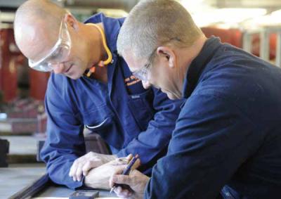 Fire protection tutor and student. 