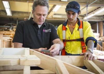 Carpentry student and tutor