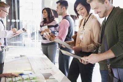 participants registering for meeting and reading information