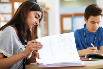 Students reading a report