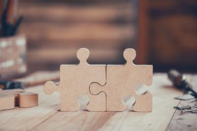 Puzzle pieces on a woodworking table